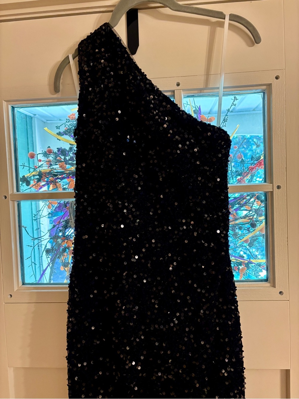 One-Shoulder Black Sequin Gown with a strappy back.